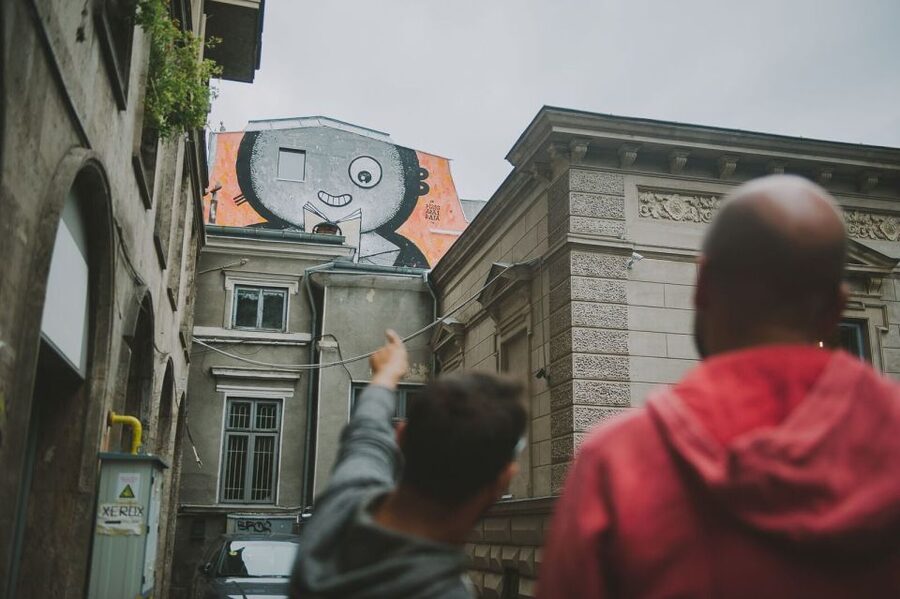 Bucharest Alternative Walking Tour - Cinema Capitol Garden and the Restored Square Cat Mural
