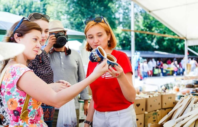 Bucharest: Hidden Markets Walking Tour with Tastings - Obor Market tastings: tuica, peasant platters, cheeses, and mici