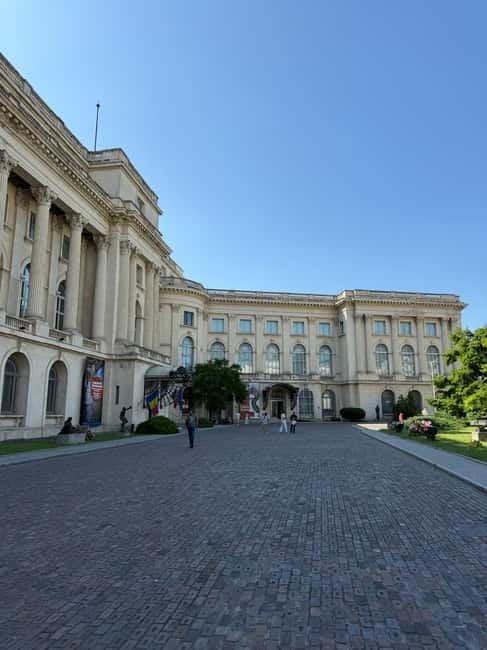 Bucharest: National Museum of Art of Romania Guided Tour - Entering the National Museum of Art of Romania, in a palace