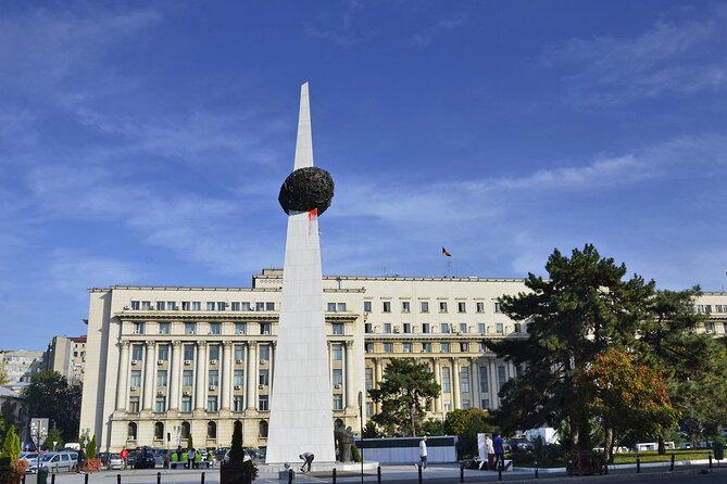 Bucharest one day tour with Parliament Palace and Village Museum - Revolution Square, monuments, and the Ceausescu-to-1989 thread