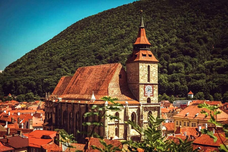 Bucharest: Peles Castle, Bran Castle & Brasov Day Trip - Brasov Old Town Walking Tour: Black Church, Council Square, and Medieval Walls