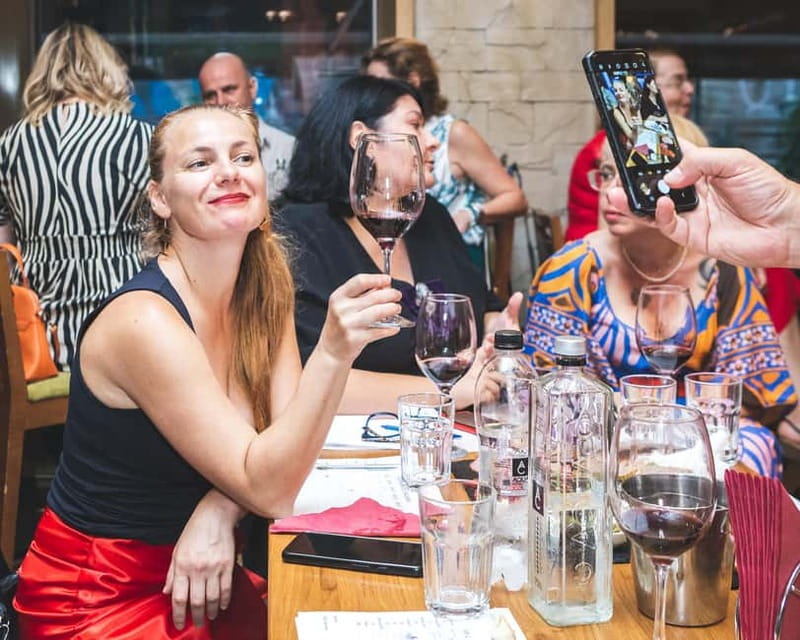 Bucharest: Romanian Wine Tasting Experience at Corks - Entering the wine shop and meeting the host style