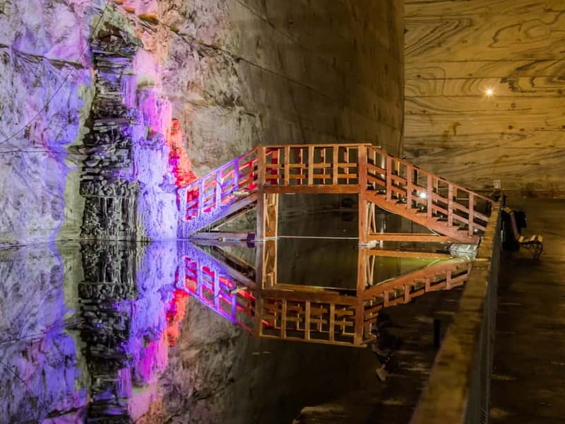 Bucharest: Salt Mine Day Trip to Slănic - Entering the mine: from salt air to a 70-meter hall