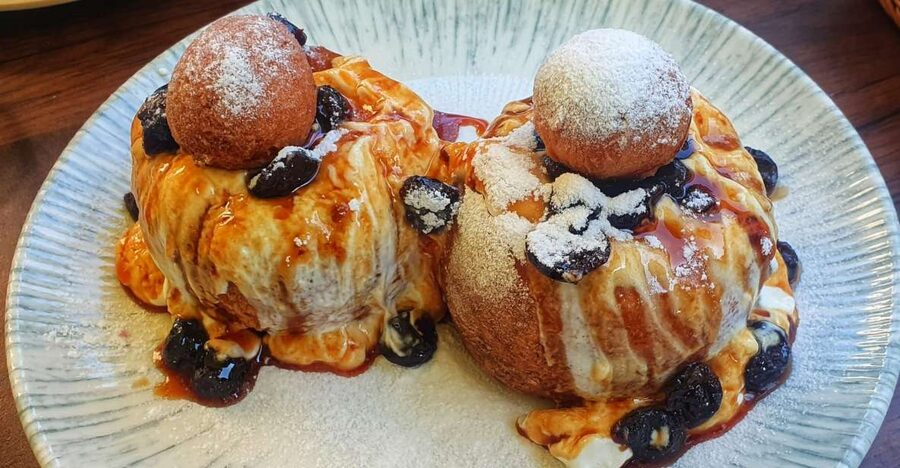 Bucharest: Sweet Delights History and Desserts Walking Tour - Capsa Pastry stop and the feeling of eating history