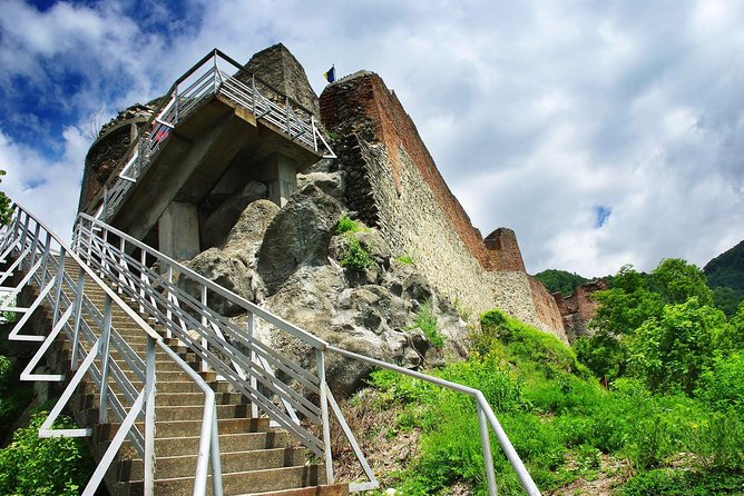 Private Day Trip True Castles of Vlad Dracula and Transfagarasan Road - Vidraru Dam: a short stop that feels like a giant snapshot