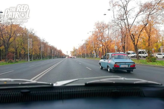 Private - Romanian Vintage Car Driving Tour of Bucharest 120 min - Arcul de Triumf photo stop: your quick reset for photos and facts